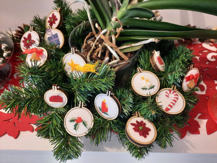 Embroidered Christmas ornaments: holly, poinsettia, candles, candy cones, bells...