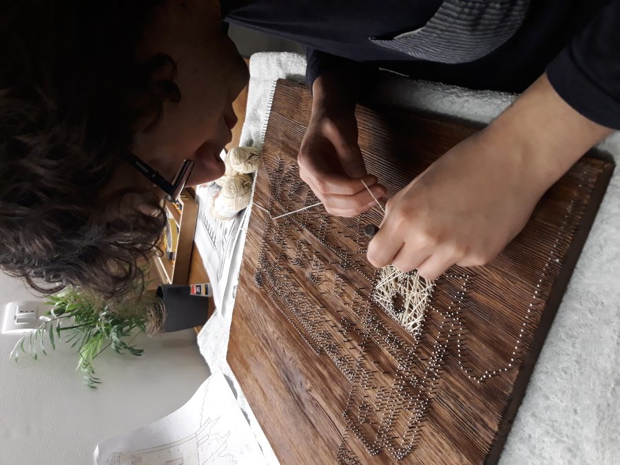 Castle string art: the weaving begins