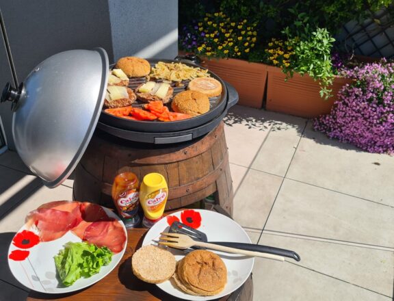 Restored old wine barrel: the barrel in use as a grill stand
