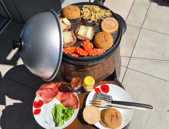 Restored old wine barrel: the barrel in use as a grill stand