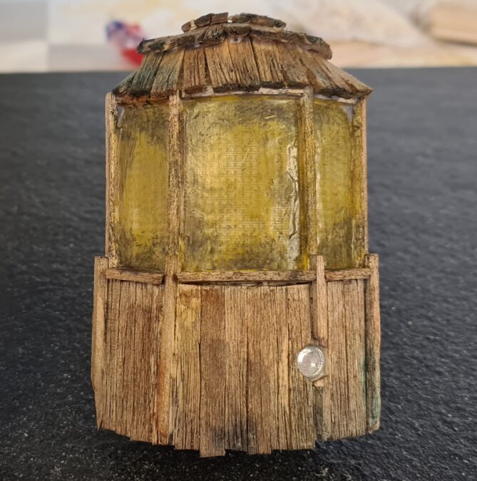 Night light decorated with wood to fake a window
