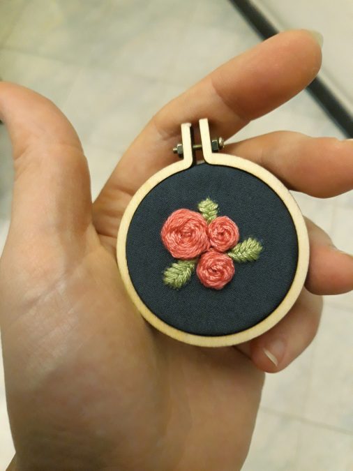 Embroidered rose pendant