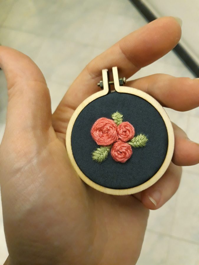 Embroidered rose pendant