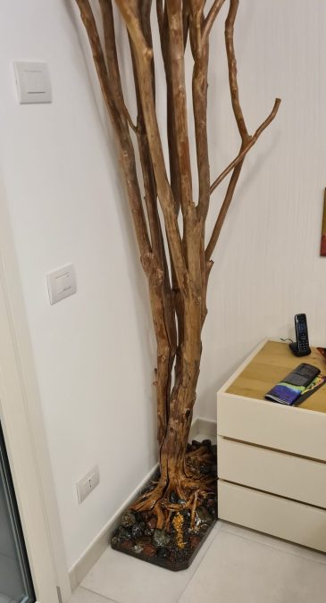 Real tree with epoxy resin stream pedestal