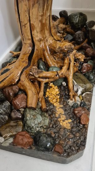 Real tree with epoxy resin stream pedestal