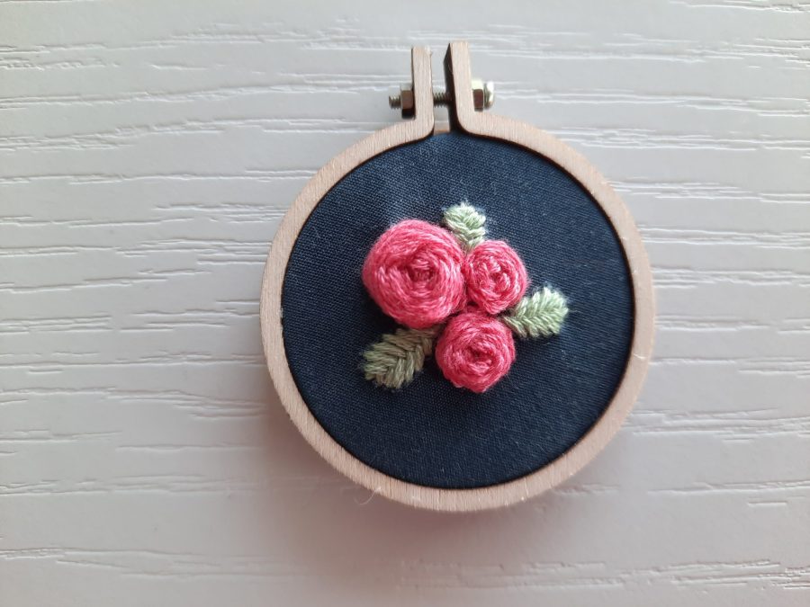 Embroidered rose pendant