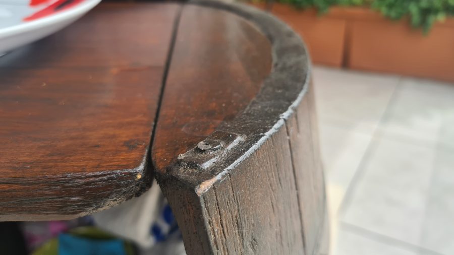 Restored old wine barrel: door detail with the magnet used for closing