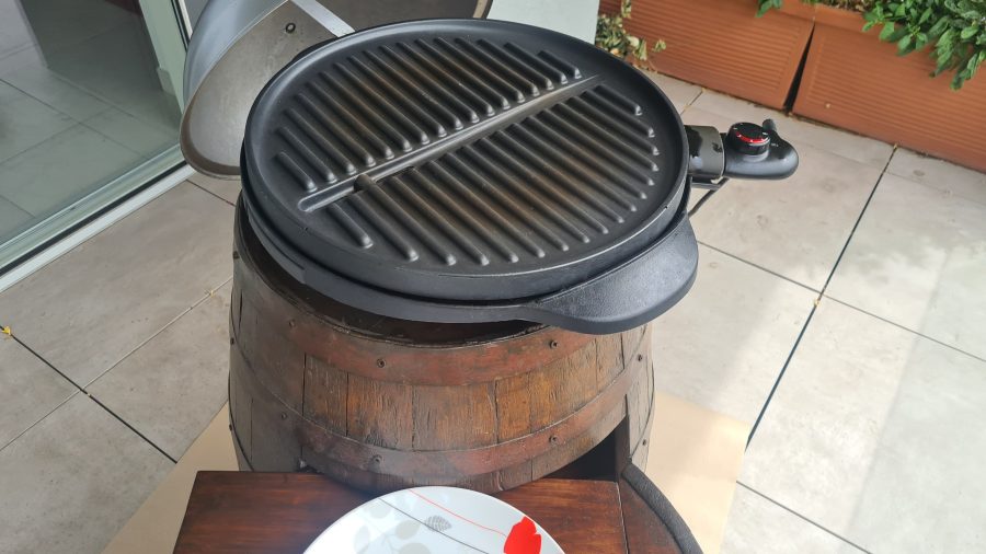 Restored old wine barrel: the grill on top