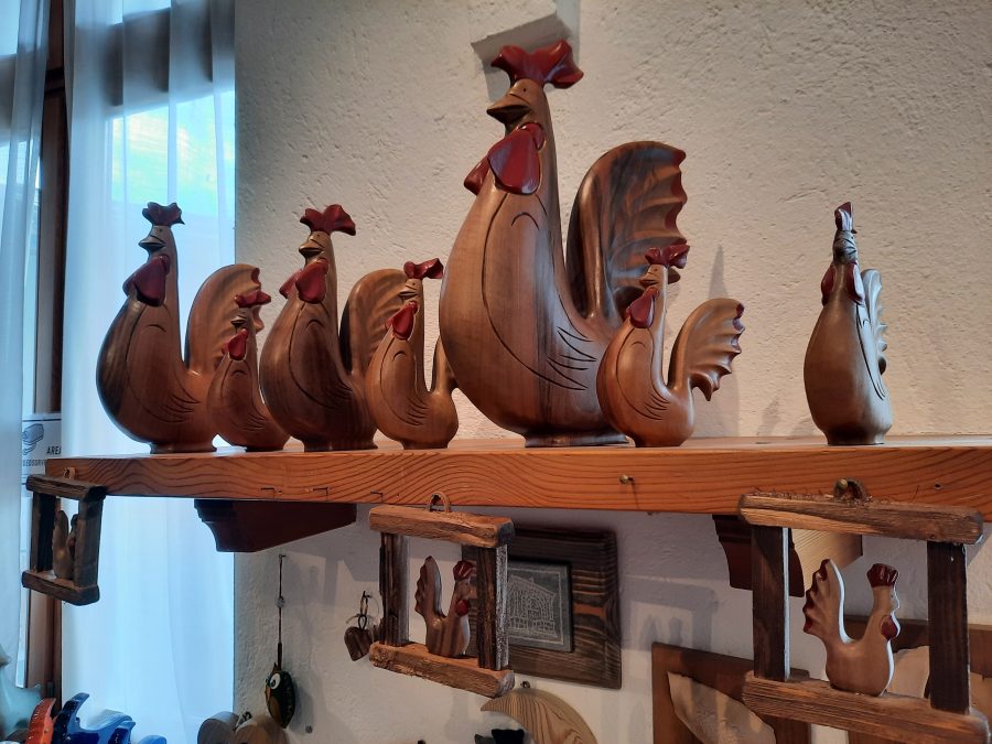 Roosters in L'Artisana Boutique in Courmayeur, Valle d'Aosta, Italy