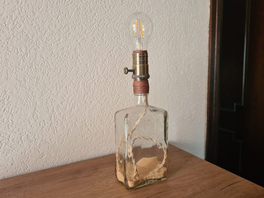 Bottle lamp with sand
