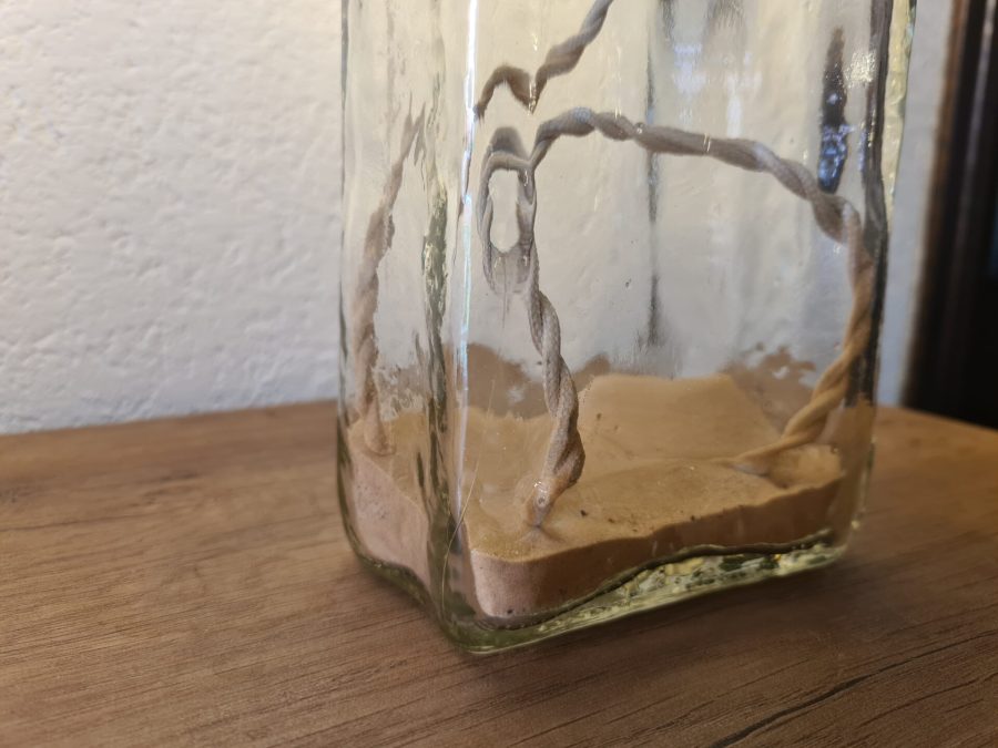 Bottle lamp with sand
