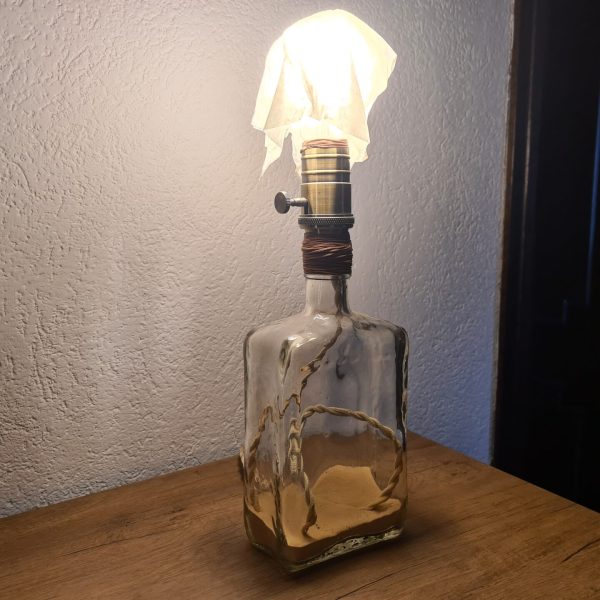 Bottle lamp with sand