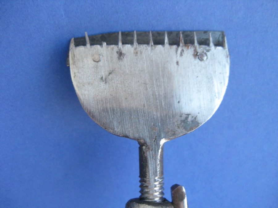 End-piece detail of vintage metal weaving temple from Sweden, date unknown
