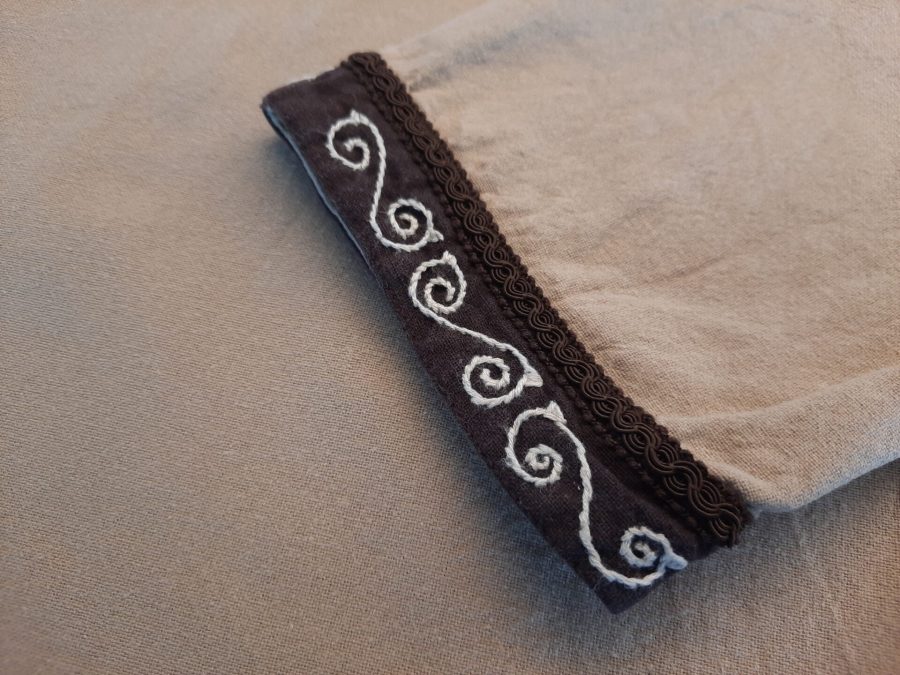 The embroidered cuffs on Locutus's Celtic tunic