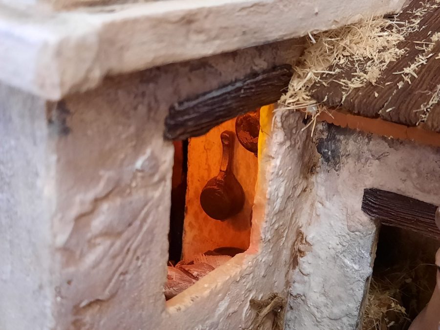 Nativity diorama inside an antique steamer trunk: the kitchen