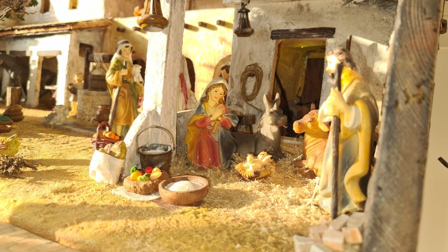 Nativity diorama inside an antique steamer trunk: the holy family