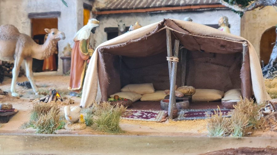 Nativity diorama inside an antique steamer trunk: the tent in the oasis