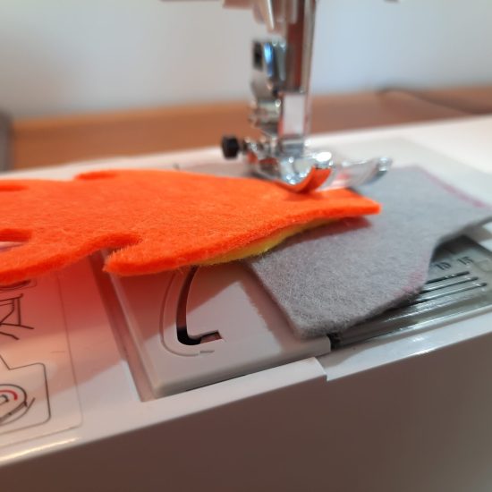 Making the engines for the rocket costume: sewing the engine pieces together