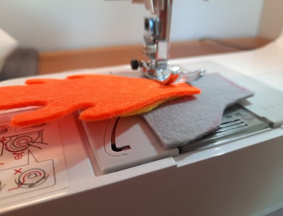 Making the engines for the rocket costume: sewing the engine pieces together