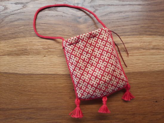Red and yellow Medieval purse, embroidered with German brick stitch and with lucetted strap and cord