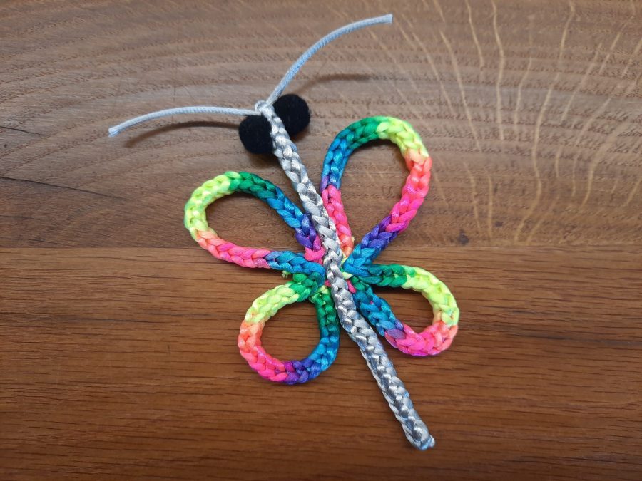 Little toy butterfly made with the lucet