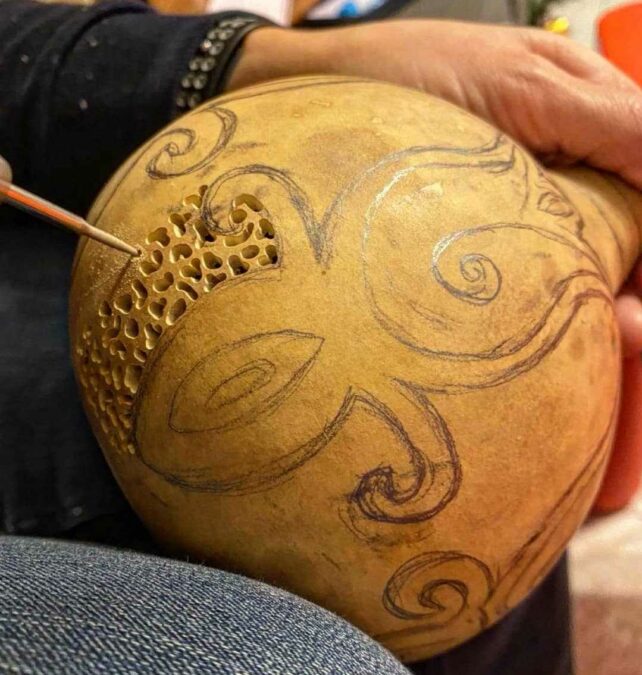 Mariangela Faccini carving one of her pumpkins to make a lamp