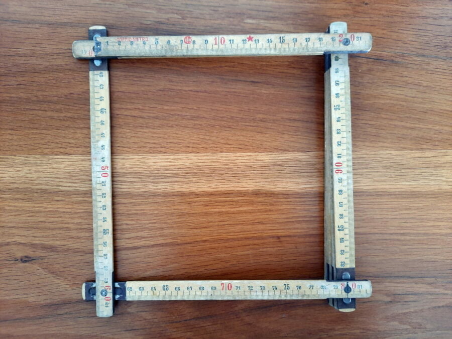 The folding ruler just before being repurposed as an embroidery frame