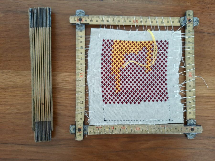The folding ruler before and after being repurposed as an embroidery frame