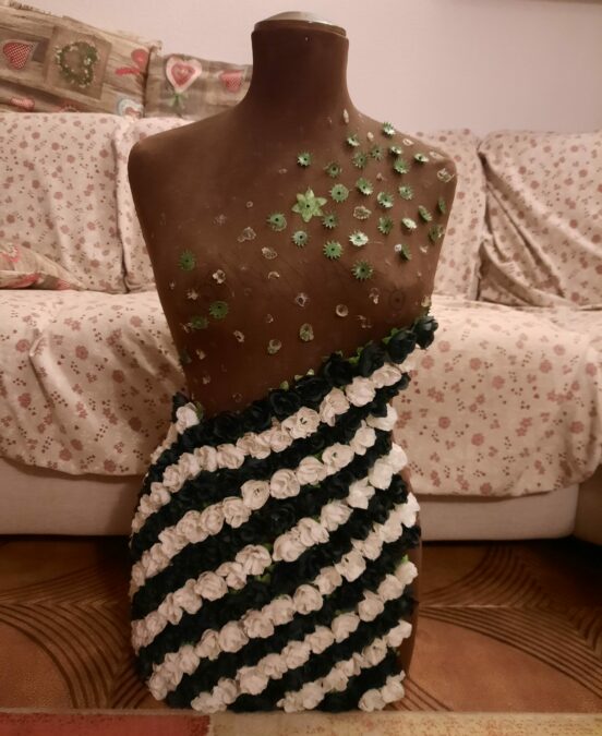 My thrifted dress form as I was removing the plastic flowers