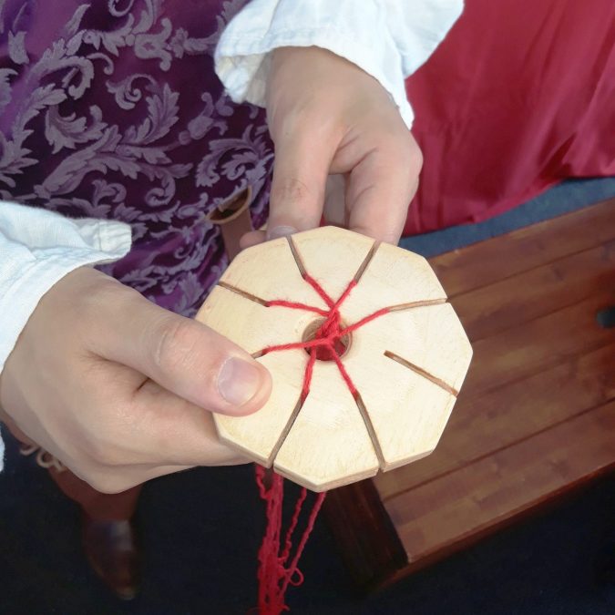 Locutus trying a reproduction of a trollen wheel in 2015
