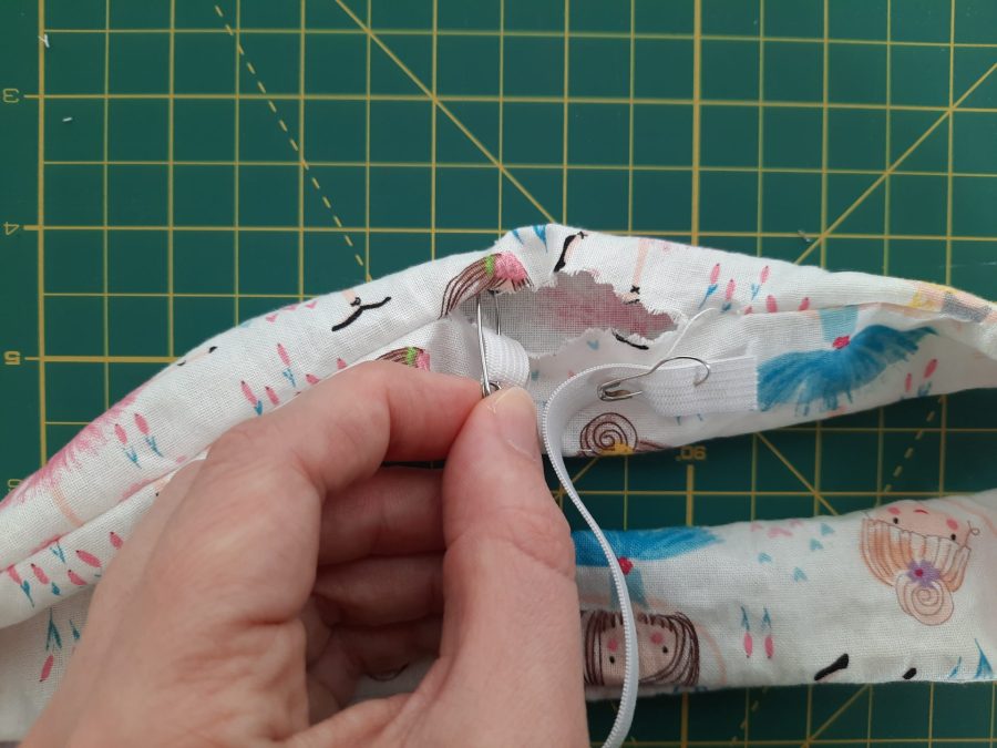 Sewing a scrunchie: use a safety pin to thread elastic throug the ring of fabric