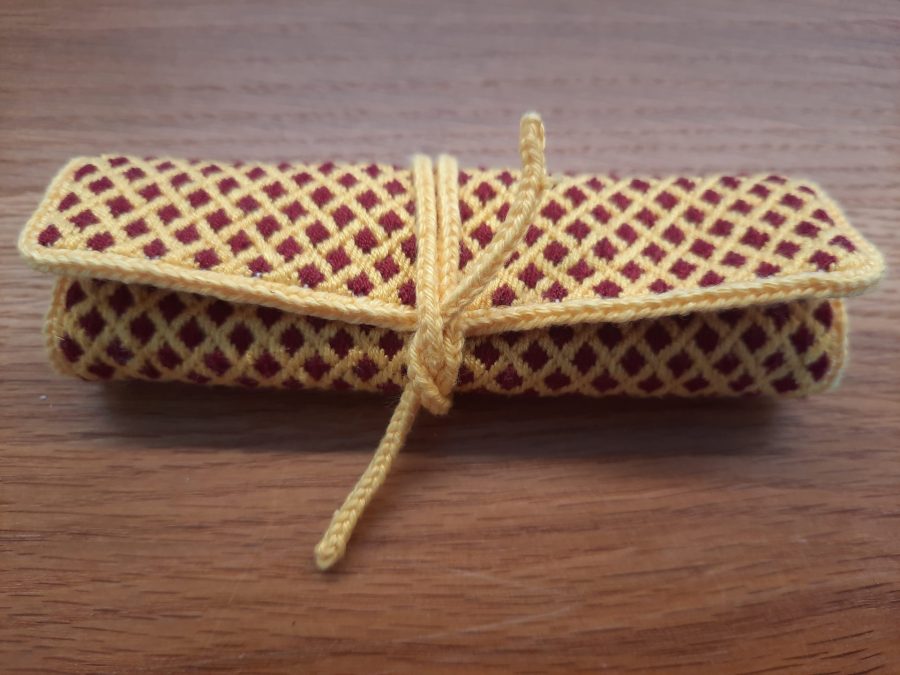 Brick stitch embroidered needle roll for Medieval reenactment