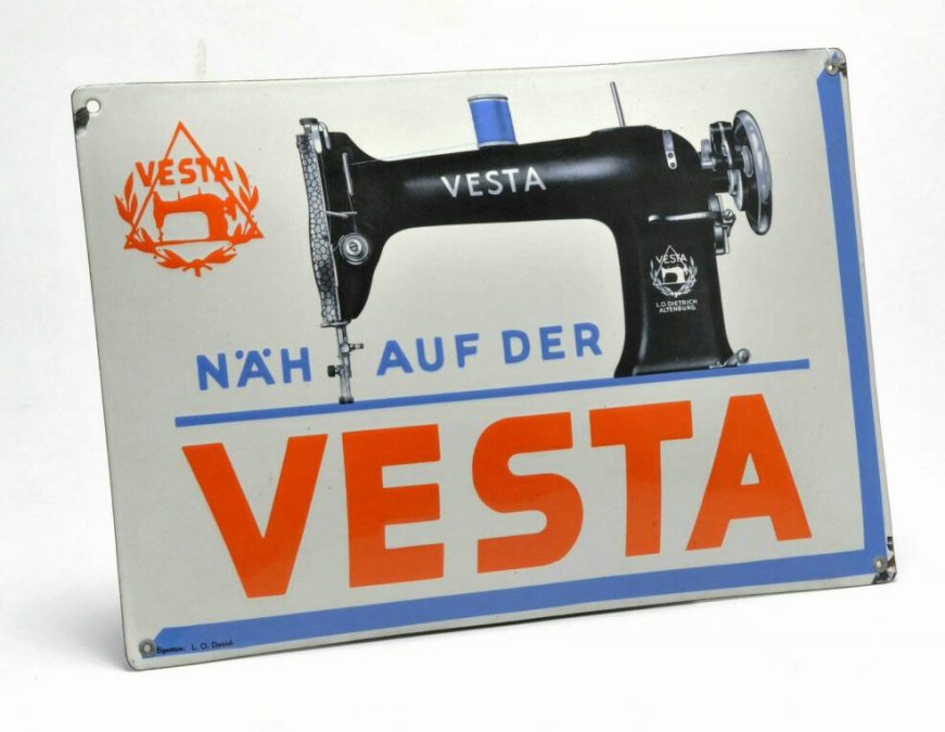 An advertisement plaque reading "Nourishing on Vesta"