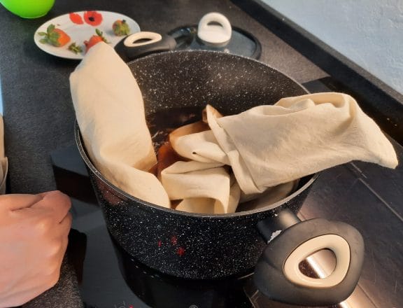 Making a kid's Medieval tunic: dyeing with onions