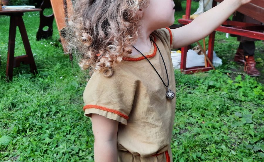 Medieval child's tunic, dyed orange-ish at home using onions