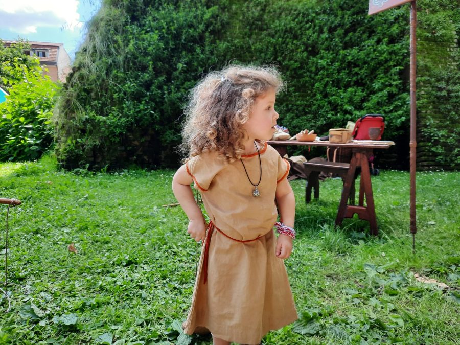 Medieval child's tunic, dyed orange-ish at home using onions