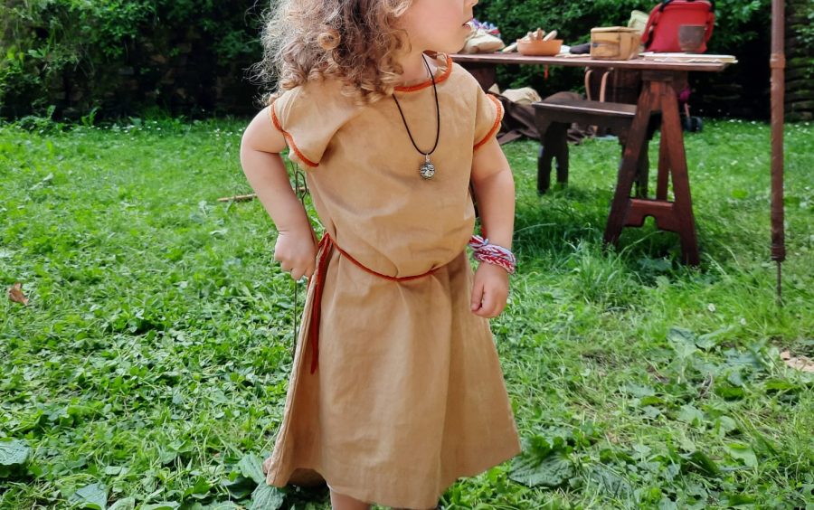 Medieval child's tunic, dyed orange-ish at home using onions