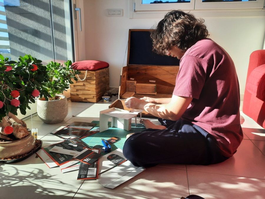 Making a cardboard model of the buildings for the Christmas nativity diorama inside the steamer trunk