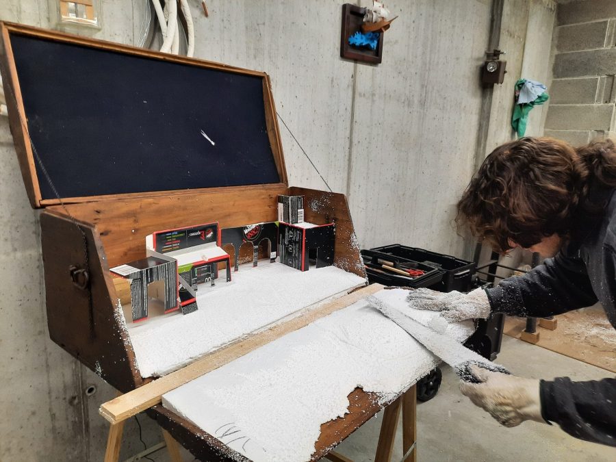 Making the landscape for our Christmas nativity diorama inside the steamer trunk: sculpting the desert landscape