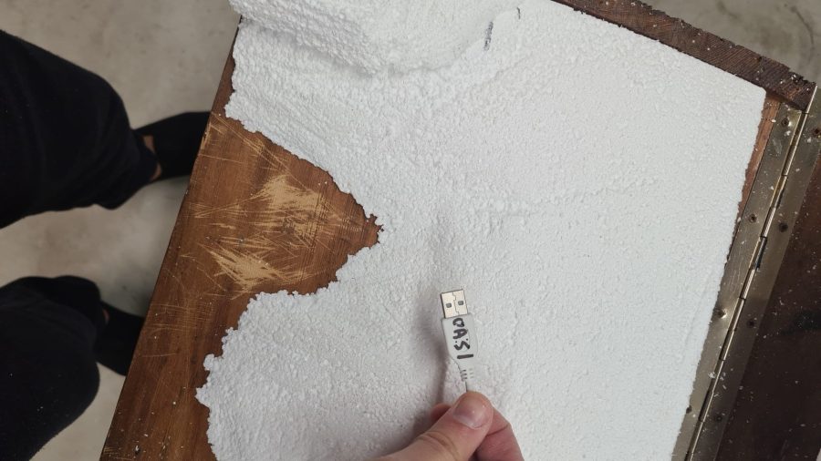 Making the landscape for our Christmas nativity diorama inside the steamer trunk: sculpting the desert landscape