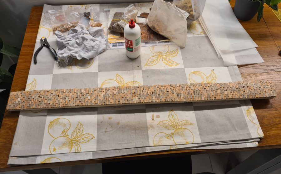 Constructing the Roman road for our Christmas nativity diorama inside the steamer trunk