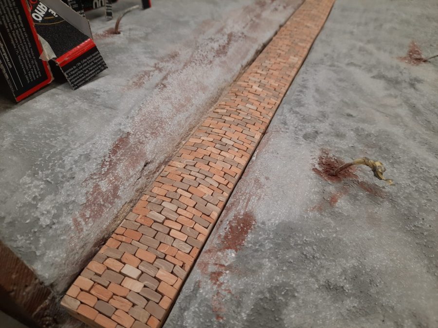 Constructing the Roman road for our Christmas nativity diorama inside the steamer trunk