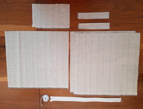 All the pieces of fabric, elastic and zipper needed to make for my embroidery project travel bag.