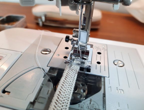 Making the ring straps for my embroidery project travel bag.