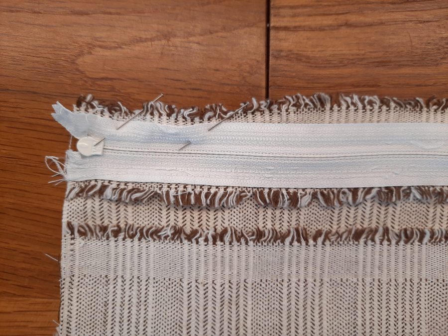 Attaching the second side of the zipper for my embroidery project travel bag