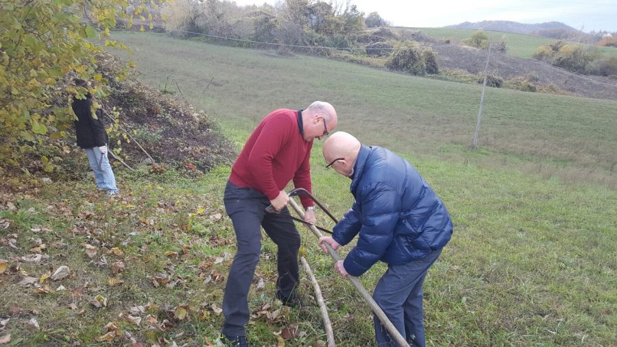 Our fathers gathering walnut branches to make bows