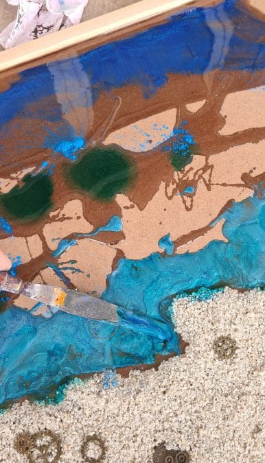 Making an epoxy resin beach: the resin pours
