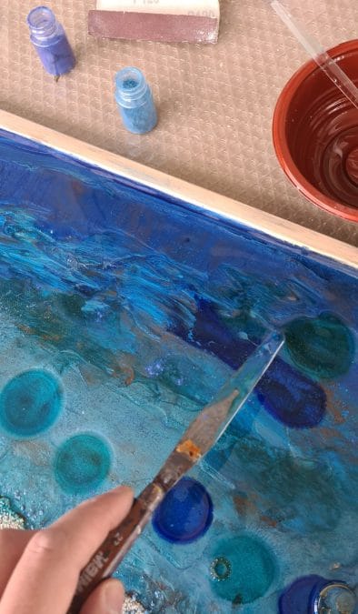 Making an epoxy resin beach: the resin pours