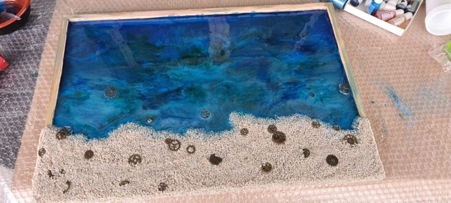 Making an epoxy resin beach: the resin pours
