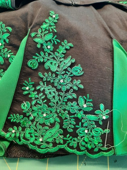 Making my Irish dance Solo dress: adding lace and crystals to the black panels of the skirt